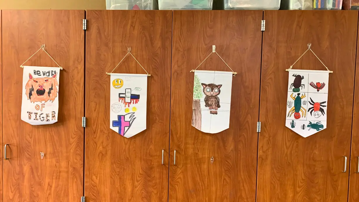 Banners decorated by students for QUEST Creators